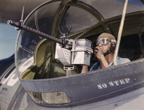 Jesse Rhodes Waller, A.O.M., third class, tries out a 30-calibre...Corpus Christi, Texas, 1942. Creator: Howard Hollem.