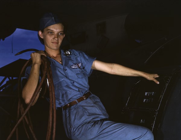 With a woman's determination, Lorena Craig takes over a man-size job, Corpus Christi, Texas, 1942. Creator: Howard Hollem.