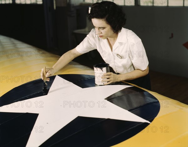 Women from all fields have joined the production army, Corpus Christi, Texas, 1942. Creator: Howard Hollem.