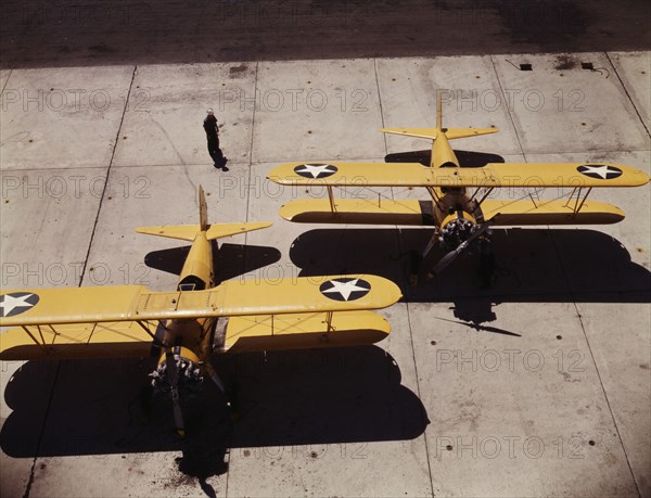 Navy N2S primary land planes at the naval Air Base, Corpus Christi, Texas, 1942. Creator: Howard Hollem.