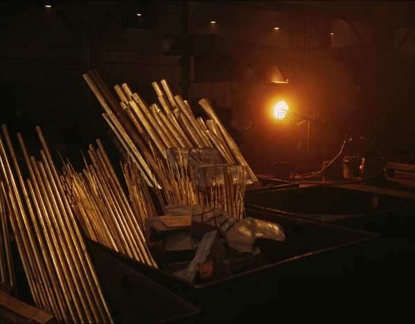 Metal tubing at the Consolidated Aircraft Corp. plant, Fort Worth, Texas, 1942. Creator: Howard Hollem.