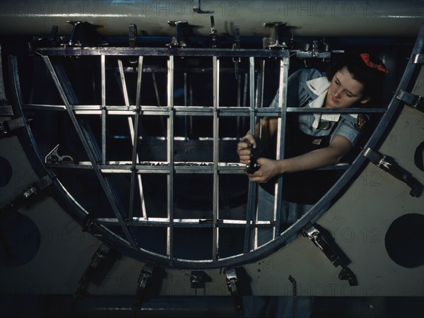 Helen Bray, who left school to become a mech..., Consolidated Aircraft Corp, Fort Worth, Texas, 1942 Creator: Howard Hollem.