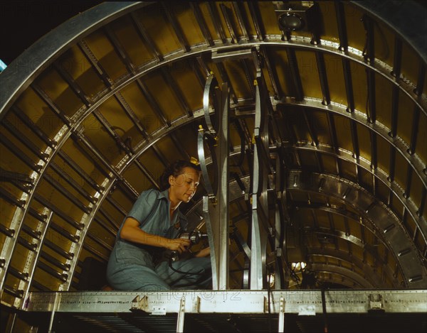 Production of B-24 bombers and C-87 transports, Consolidated Aircraft Corp., Fort Worth, Texas, 1942 Creator: Howard Hollem.