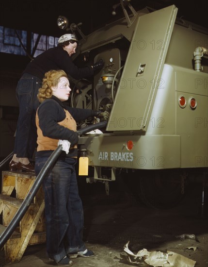 Helen Ryan, age 41 (with cap), widow and used to work..., Heil and Co., Milwaukee, Wisconsin, 1943. Creator: Howard Hollem.