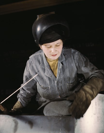 Enola O'Connell, age 32, widow and mother of one child...Heil and Co., Milwaukee, Wisc., 1943. Creator: Howard Hollem.