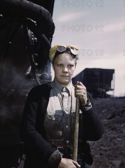 C. & N.W. R.R., Mrs. Irene Bracker, mother of two children, employed at the..., Clinton, Iowa, 1943. Creator: Jack Delano.