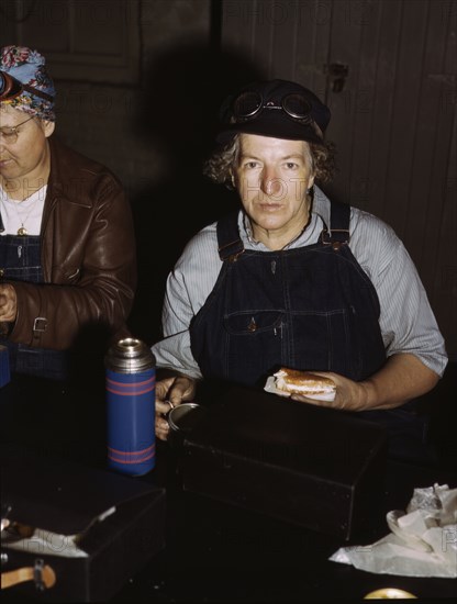 C. & N.W. R.R., Mrs. Elibia Siematter, employed as a sweeper at the roundhouse, Clinton, Iowa, 1943. Creator: Jack Delano.