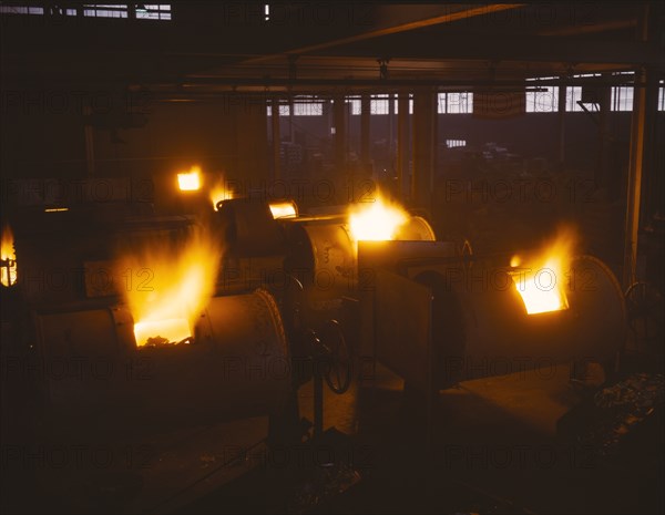 A battery of 1,000 and 2,000 pound furnaces roaring threats to..., Aluminum Industries Inc. , 1942. Creator: Alfred T Palmer.