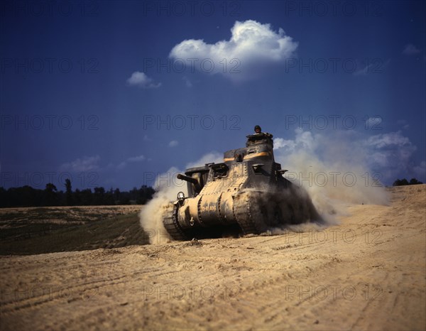 An M-3 tank in action, Ft. Knox, Ky., 1942. Creator: Alfred T Palmer.