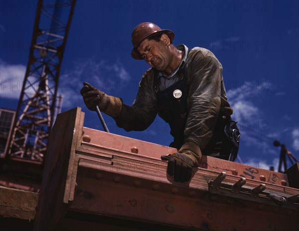 Big Pete Ramagos, rigger at work on dam (TVA) Douglas Dam, Tenn., 1942. Creator: Alfred T Palmer.