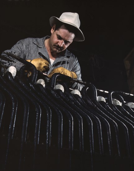 Generator works at the winding of a generator stator...Wilson Dam, Sheffield vicinity, Ala., 1942. Creator: Alfred T Palmer.