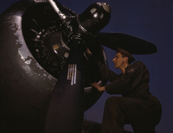 Servicing [an] A-20 bomber, Langley Field, Va., 1942. Creator: Alfred T Palmer.