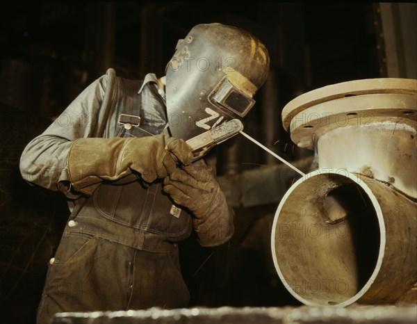 Welder making boilers for a ship, Combustion Engineering Co., Chattanooga, Tenn., 1942. Creator: Alfred T Palmer.