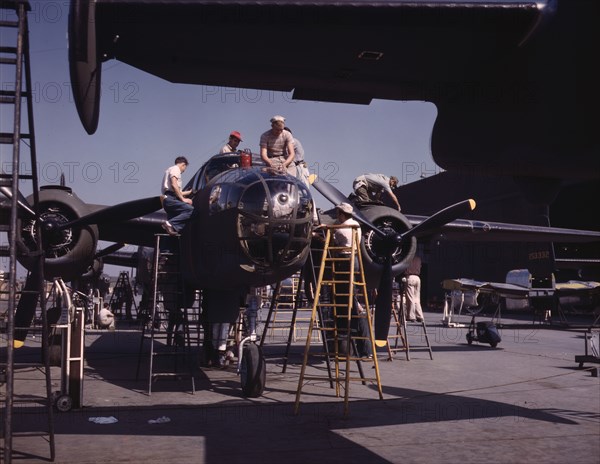 Employees on the "Sunshine" assembly line at North American's plant..., Inglewood, Calif., 1942. Creator: Alfred T Palmer.