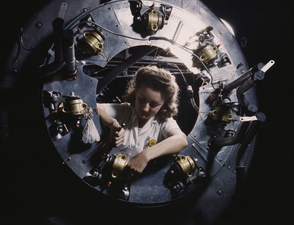 Part of the cowling for one of the motors for a B-25...North American Aviation, Inglewood, CA., 1942 Creator: Alfred T Palmer.