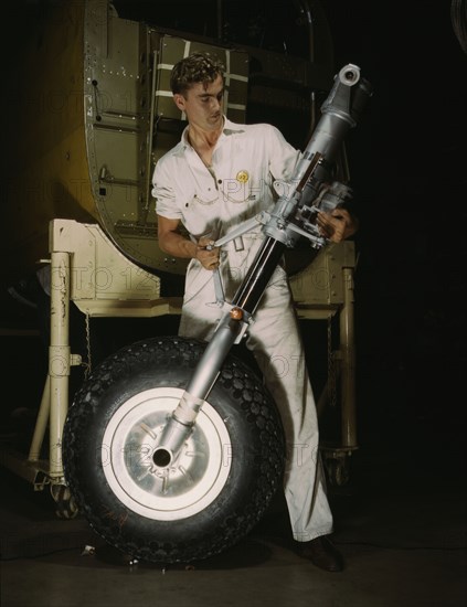 A nose wheel and landing gear assembly for a B-25..., North American Aviation, Inc., Calif., 1942. Creator: Alfred T Palmer.