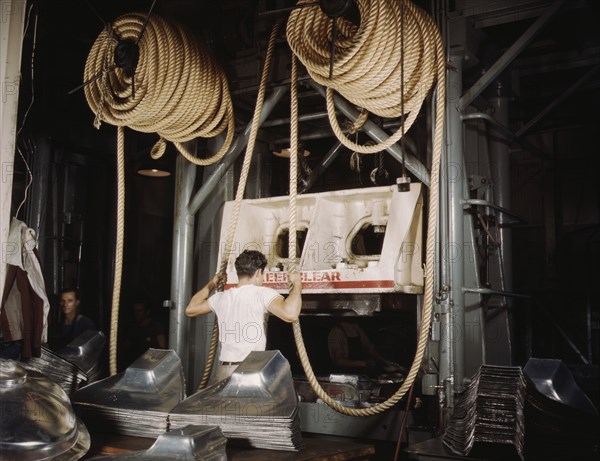 Huge drop hammers work day and night form...North American Aviation, Inc., Inglewood, Calif. , 1942. Creator: Alfred T Palmer.