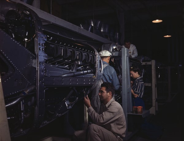 Employees at North American Aviation, Incorporated, assembling..., Inglewood, Calif., 1942. Creator: Alfred T Palmer.
