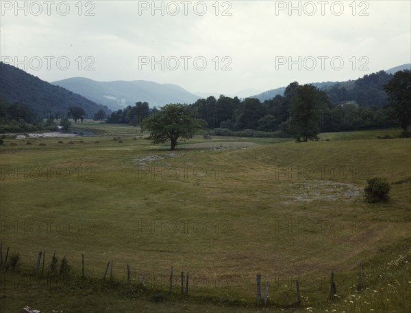 Farmland along the upper Delaware River in New York state, 1943. Creator: John Collier.