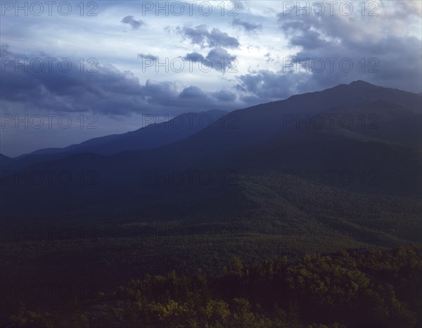 A view looking through the White Mountains from the...Pine Mountain, Gorham vicinity, N.H., 1943. Creator: John Collier.