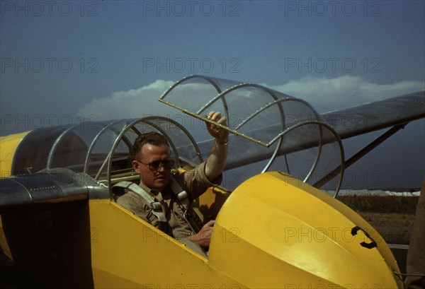 Marine glider pilot in training at Page Field, is watching take-offs, Parris Island, S.C., 1942. Creator: Alfred T Palmer.