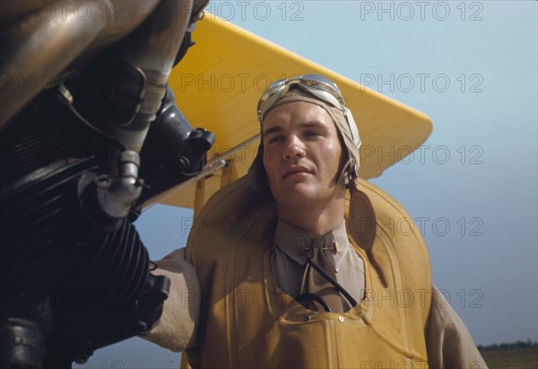 Marine lieutenant by the power towing plane for the gliders at Page Field, Parris Island, S.C., 1942 Creator: Alfred T Palmer.