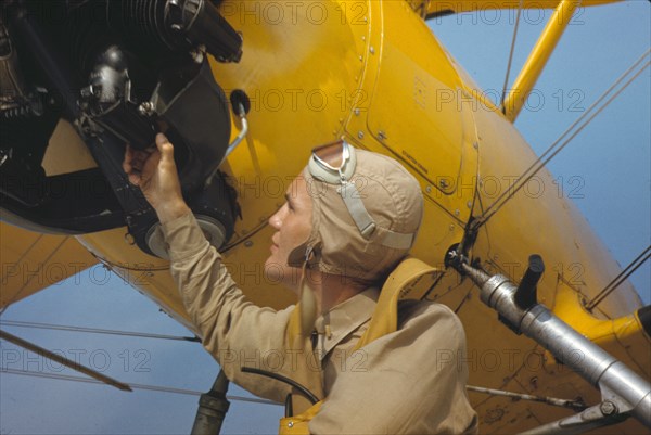 Marine lieutenant by the power towing plane for the gliders at Parris Island, S.C., 1942. Creator: Alfred T Palmer.