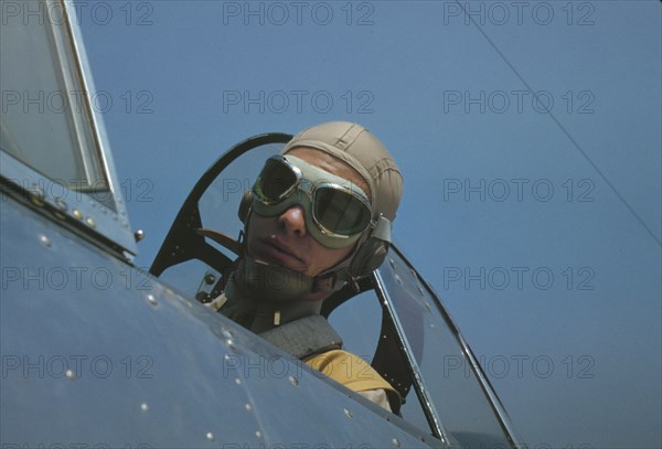 Marine lieutenant, glider pilot in training, ready for..., at Page Field, Parris Island, S.C., 1942. Creator: Alfred T Palmer.