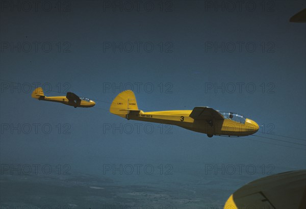 Marine gliders being towed from Page Field, Parris Island, S.C., 1942. Creator: Alfred T Palmer.
