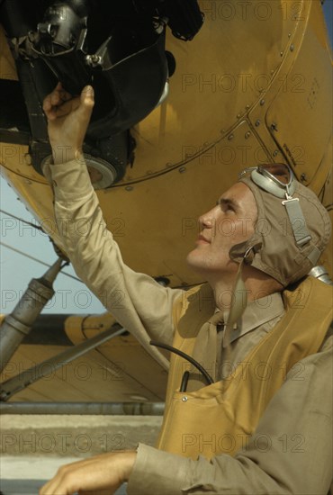 Marine lieutenant, pilot with the power towing plane for the...page Field, Parris Island, S.C., 1942 Creator: Alfred T Palmer.