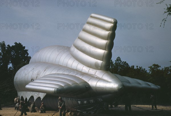 U.S. Marine Corps, bedding down a big barrage balloon, Parris Island, S.C., 1942. Creator: Alfred T Palmer.