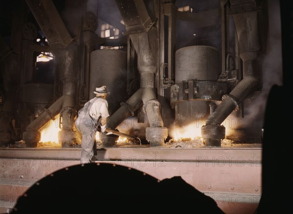 TVA chemical plant, electric furnace loaded with phosphate, vicinity of Muscle Shoals, Alabama, 1942 Creator: Alfred T Palmer.