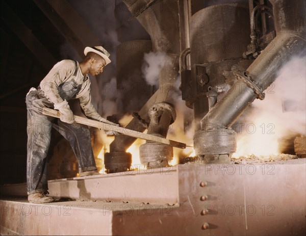 A large electric phosphate smelting furnace used to make...vicinity of Muscle Shoals, Ala., 1942. Creator: Alfred T Palmer.