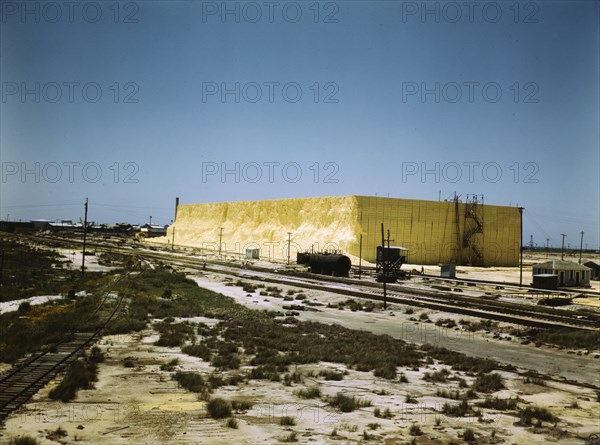 60 foot high sulphur vat, Freeport Sulphur Co., Hoskins Mound, Texas, 1943. Creator: John Vachon.