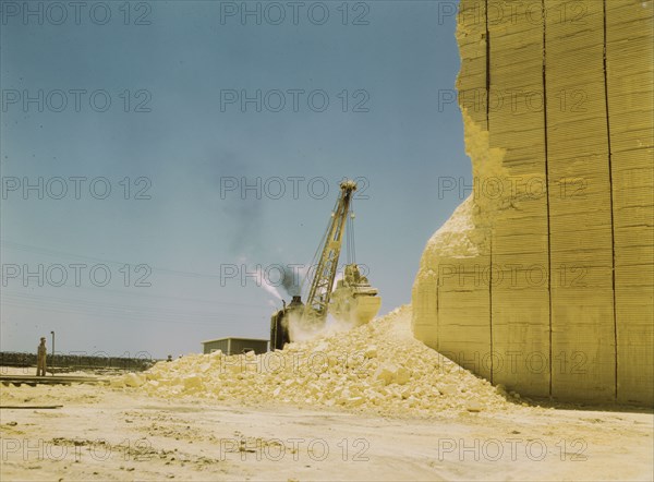 Loading sulphur from vat, Freeport Sulphur Co., Hoskins Mound, Texas, 1943. Creator: John Vachon.