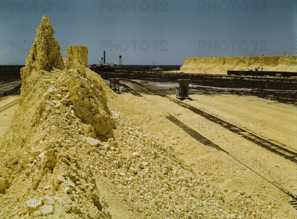 Nearly exhausted sulphur vat from which railroad..., Freeport Sulphur Co, Hoskins Mound, Texas, 1943 Creator: John Vachon.