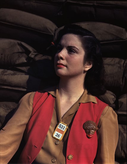 A noontime rest for a full-fledged assembly worker...Long Beach, Calif. Plant of Douglas..., 1942. Creator: Alfred T Palmer.
