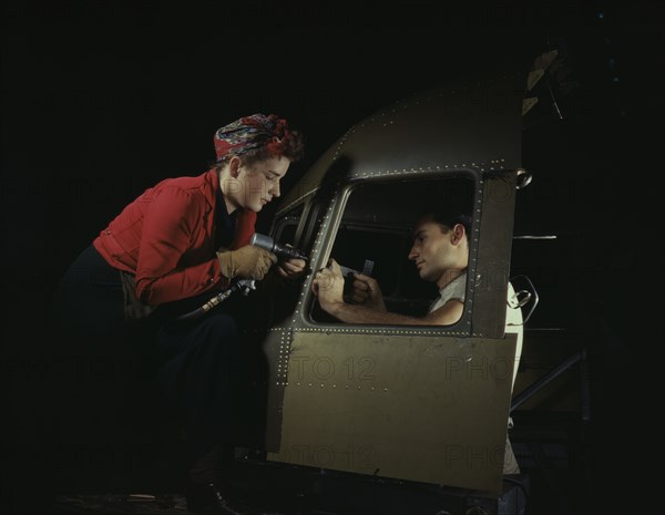 Men and women make efficient operating teams...Douglas Aircraft plant, Long Beach, Calif. , 1942. Creator: Alfred T Palmer.