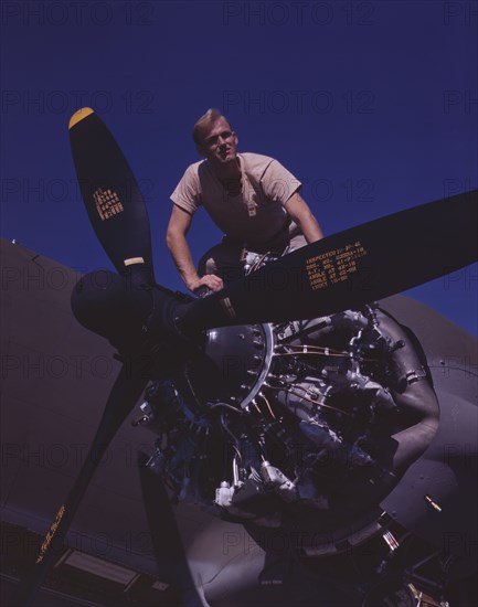 Flexible performance of C-47 transport planes is due in part to their..., Long Beach, Calif., 1942. Creator: Alfred T Palmer.