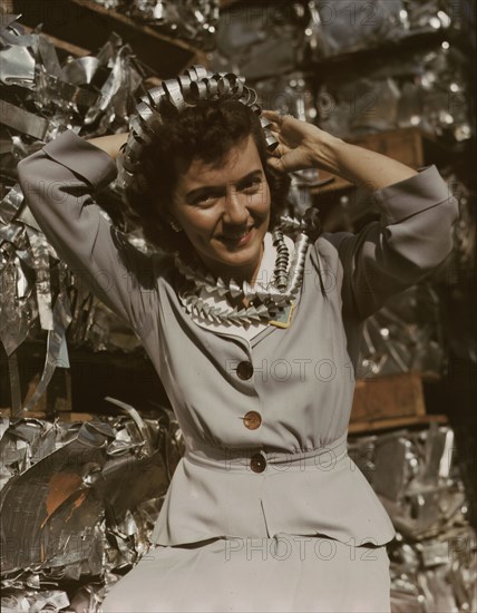 Annette del Sur publicizing salvage campaign...Douglas Aircraft Company, Long Beach, Calif., 1942. Creator: Alfred T Palmer.