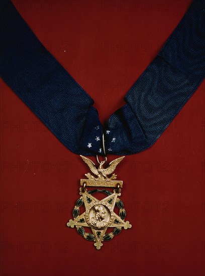 U.S. Army Medal of Honor with neck band, between 1941 and 1945. Creator: Unknown.