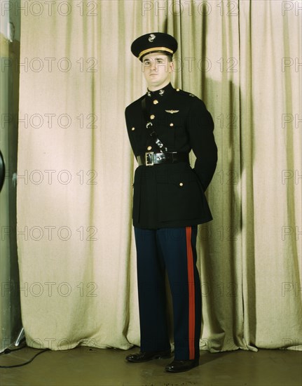 Marine Corps Captain in dress blue uniform, World War II, between 1941 and 1945. Creator: Howard Hollem.