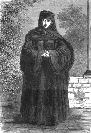 'Wallachian Lady in Travelling Costume; A Visit to the Danubian Principalities', 1875. Creator: Nelson Boyd.