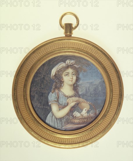 Young girl with two doves.