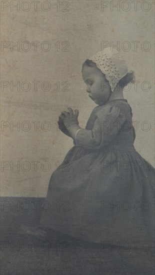 Child with apple, c1900. Creator: Ema Spencer.