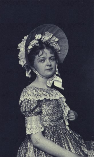 Woman wearing a bonnet, c1900.