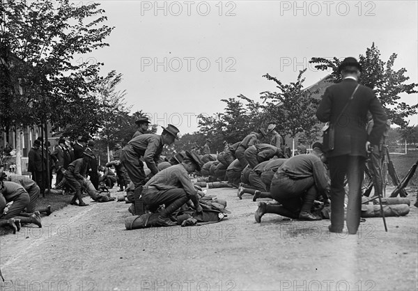 U.S. Army Inspection, 1910. [Soldiers packing kit].