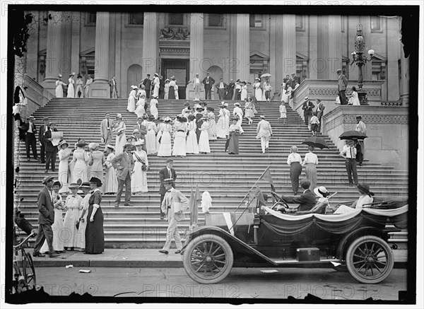 People on Capitol steps, between 1913 and 1918.