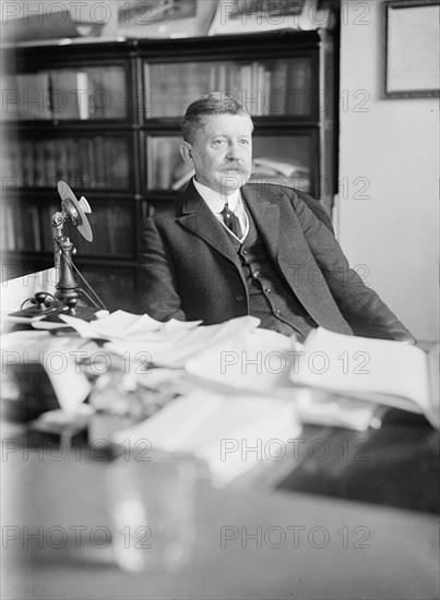 Edward B. Moore, Commissioner of Patents - At Desk, 1912. Creator: Harris & Ewing.