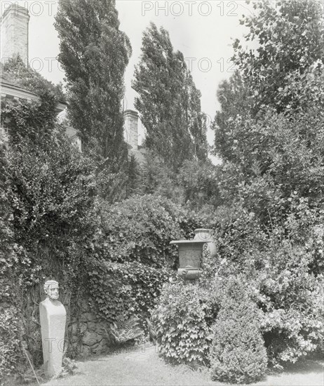 Unidentified house and garden, between 1910 and 1935.